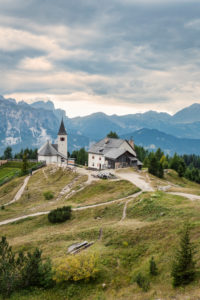 Heilig Kreuz Hospiz refuge and pilgrimage church at the foot of the Heiligkreuzkofel, in background Puez-Geisler Nature Park, Hochabtei / Alta Badia, Bolzano province, South Tyrol, Italy, Europe Heilig Kreuz Hospiz refuge and pilgrimage church at the foot of the Heiligkreuzkofel, in background Puez-Geisler Nature Park, Hochabtei / Alta Badia, Bolzano province, South Tyrol, Italy, Europe